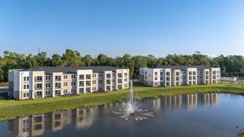 Lake on property with premium views